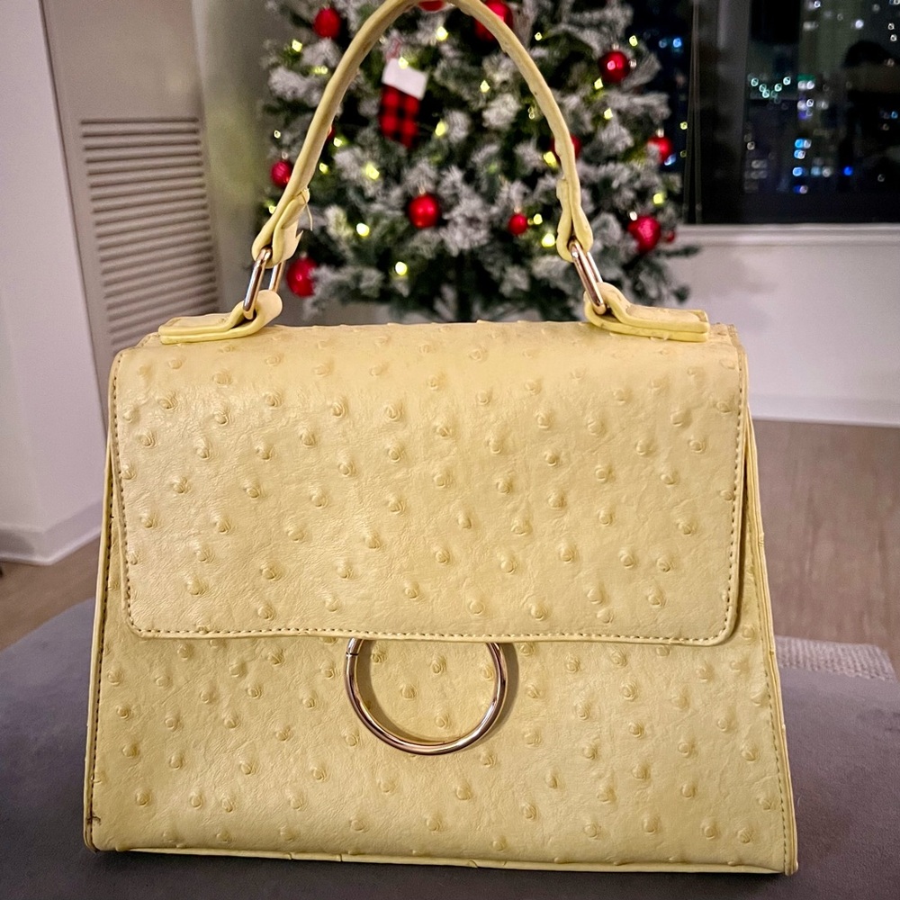 Yellowed textured polka dot purse
